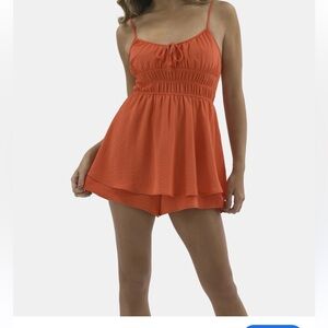 No Boundaries Vibrant Orange Romper. Like new!